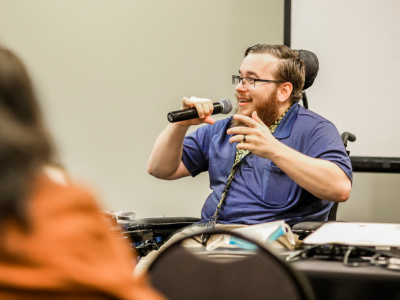 DRC advocate presenting at the 2022 Kansas Disability Caucus conference.