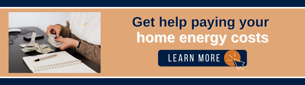 Background is a light orange rectangle bordered on the top and bottom by navy blue horizontal lines. On the right, is an image of white hands handling paper money. To the right is navy blue and white text reading "Get help paying your home energy costs." Below the text is a navy blue rectangle with white text reading "LEARN MORE" with a white computer mouse icon inside an orange circle.